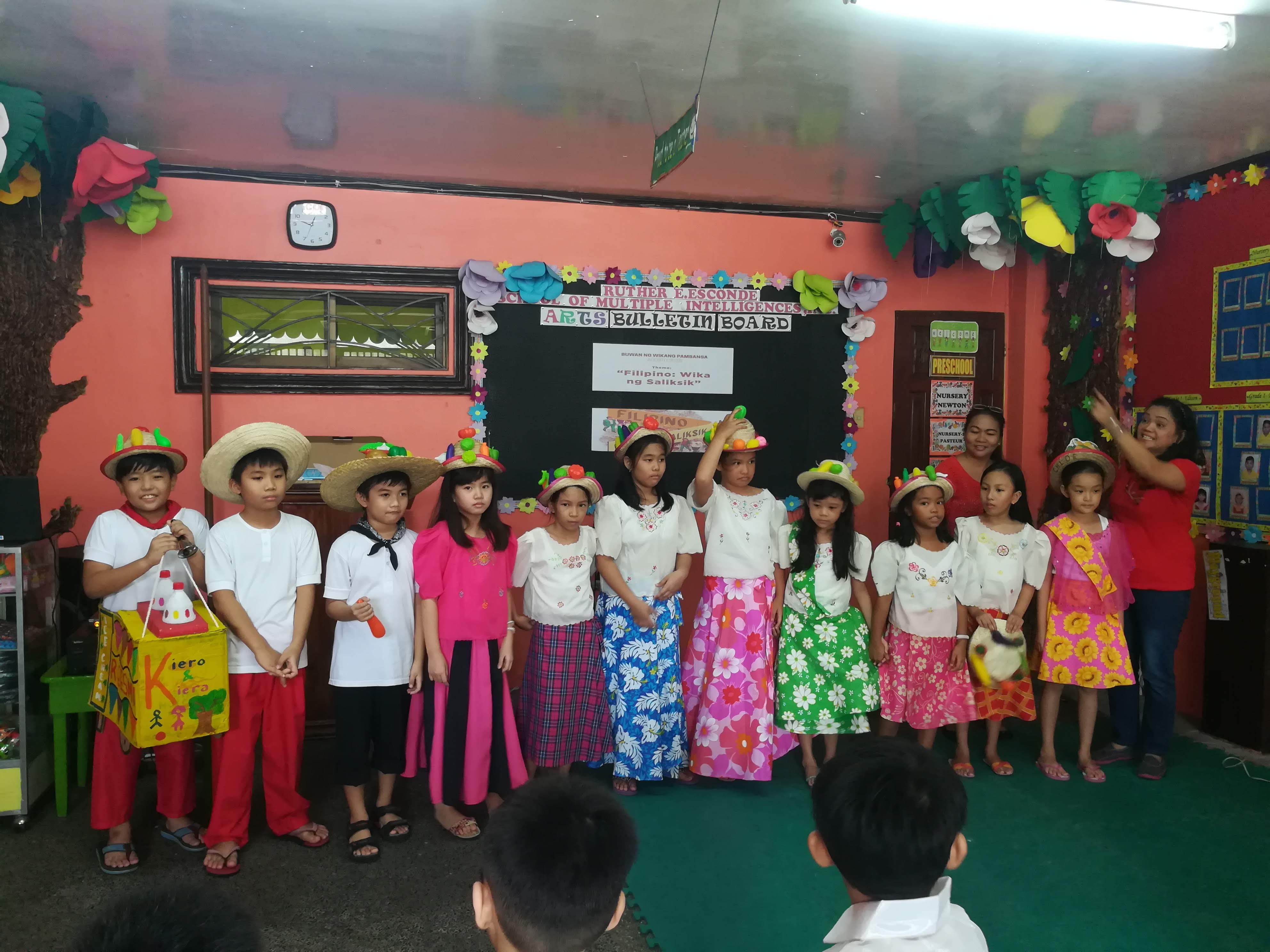 Koko, Kiera, and their classmates dressed for their Buwan ng Wika school presentation in 2018